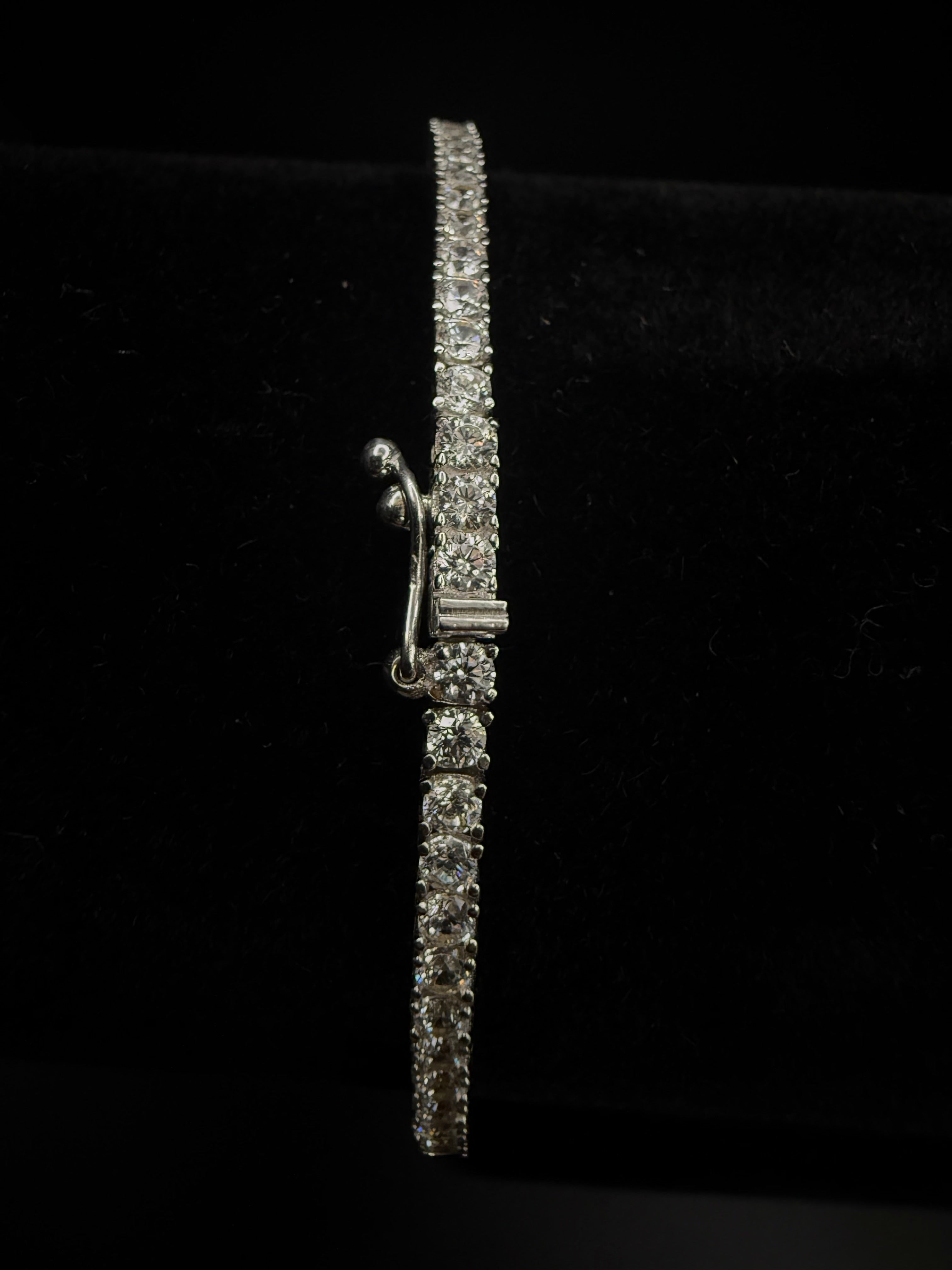 10K White Gold Tennis Bracelet 2.4mm 7" -
Iced CZ